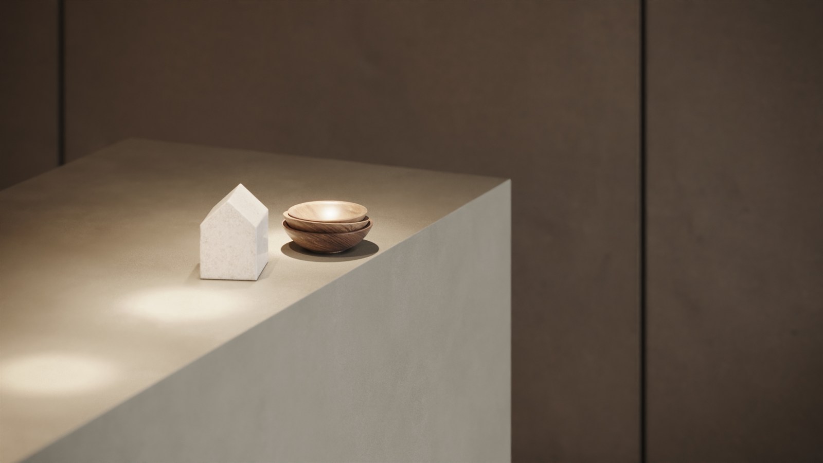 Still life detail: marble object and wooden bowls on the reception counter