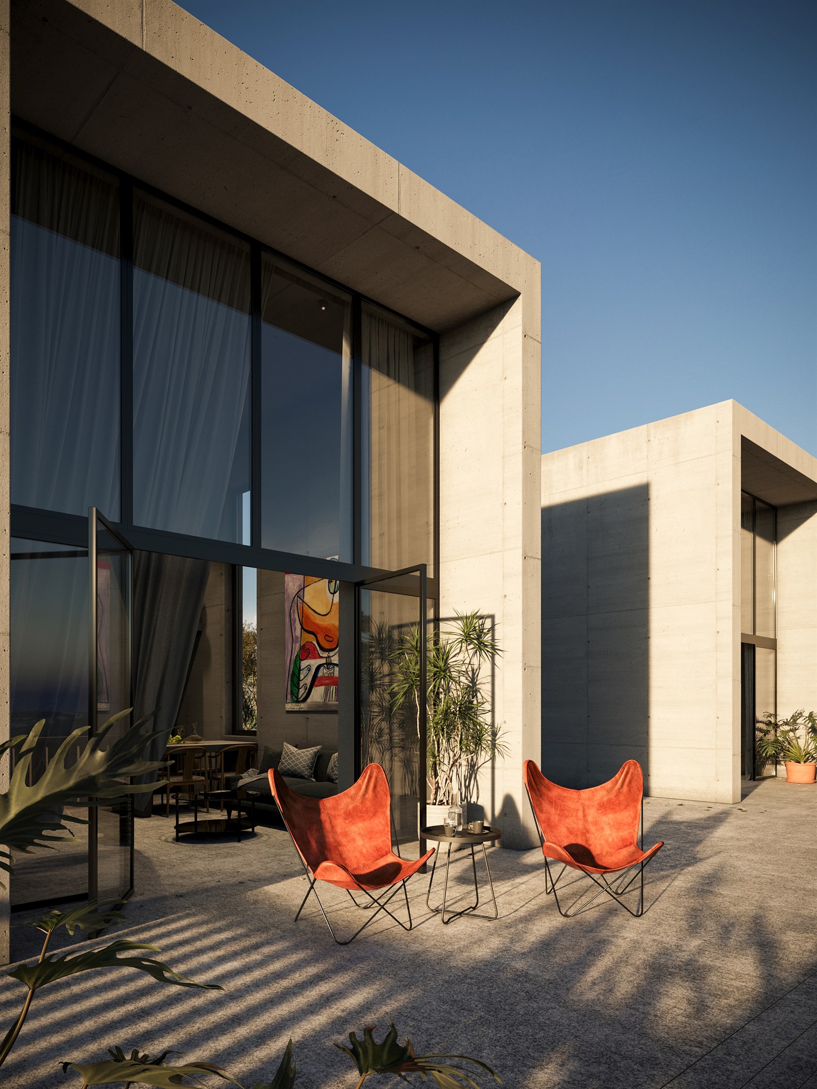 Late sun raking the terrace, chairs facing the open view