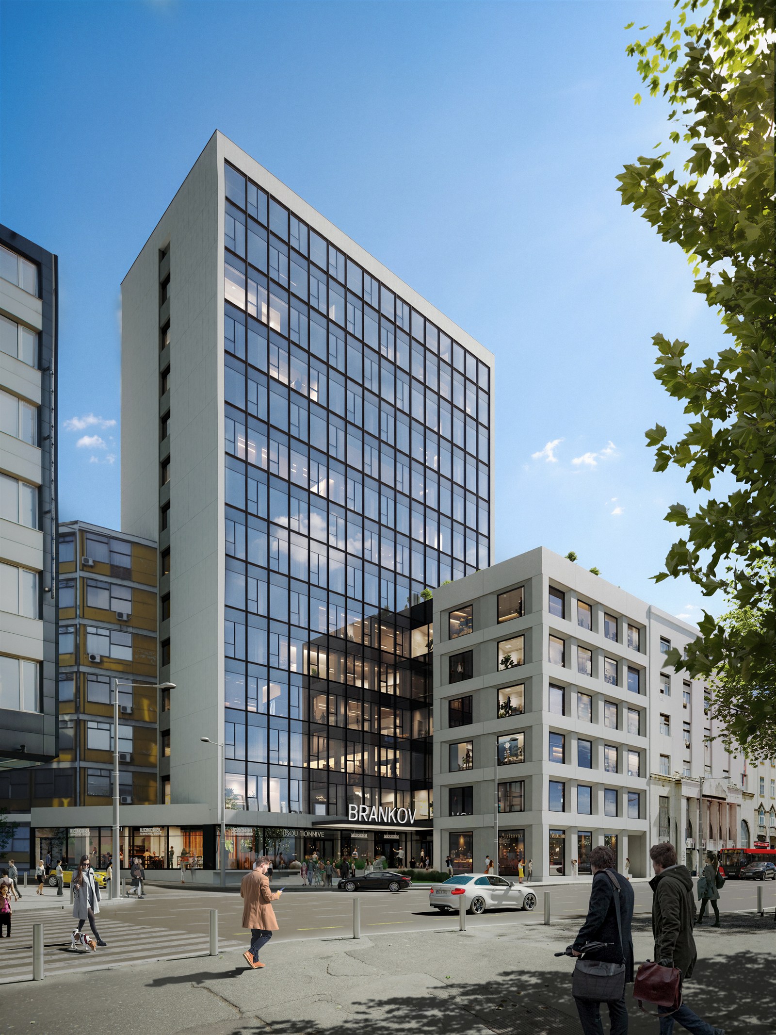 Glass office tower on a city corner with plane tree and street life