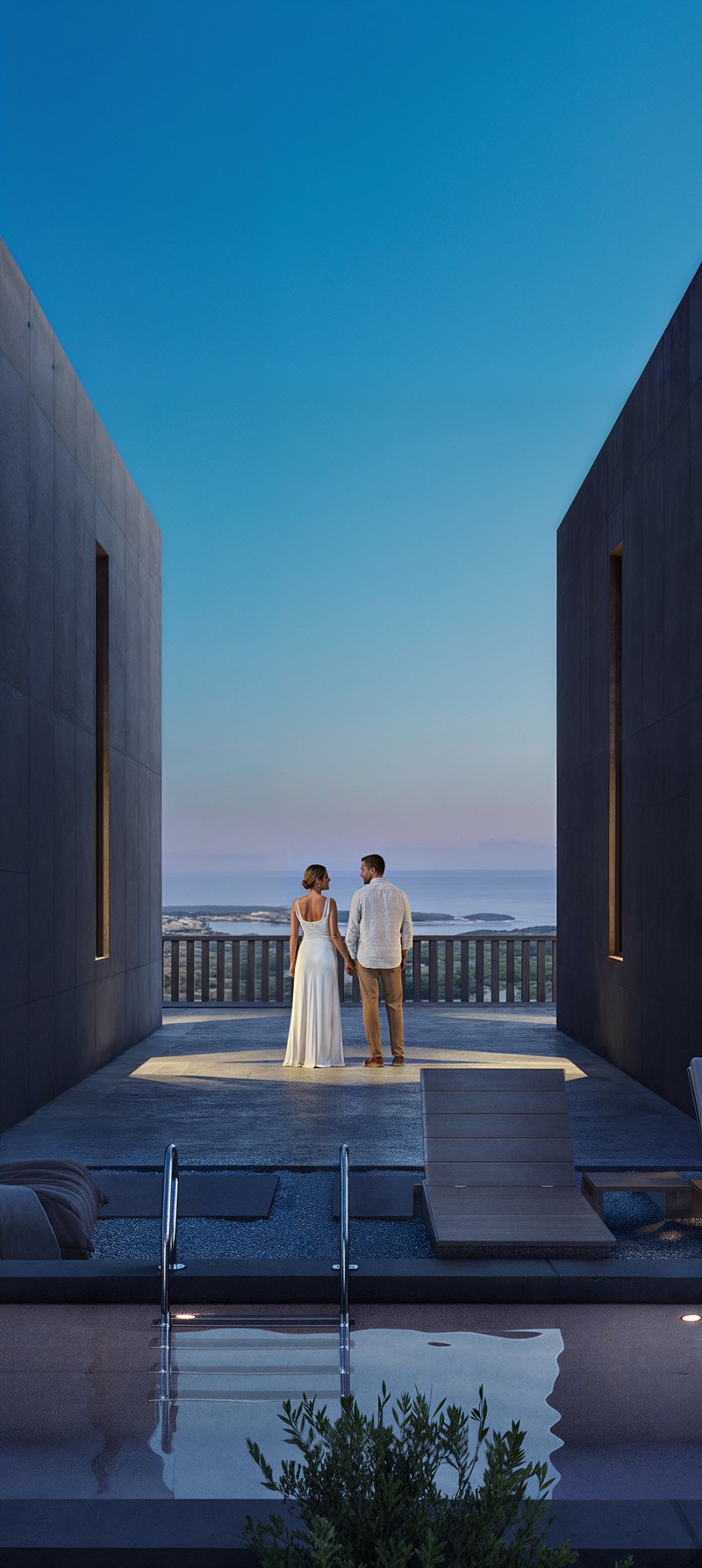 Twins — two villas above the sea at dusk