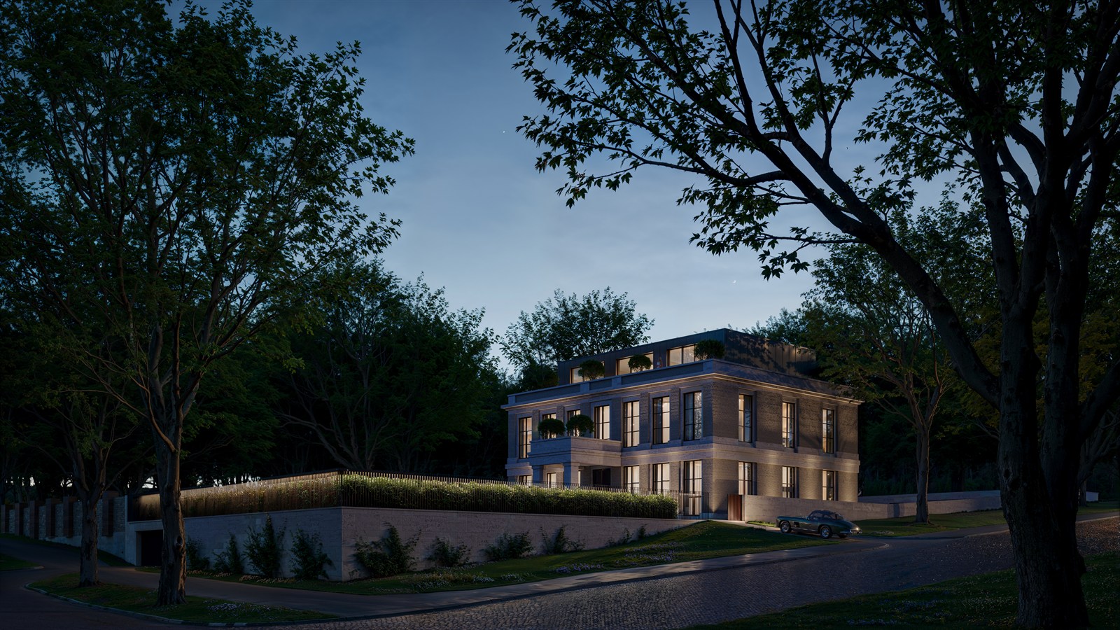 Private villa lit behind a hedge wall at blue hour