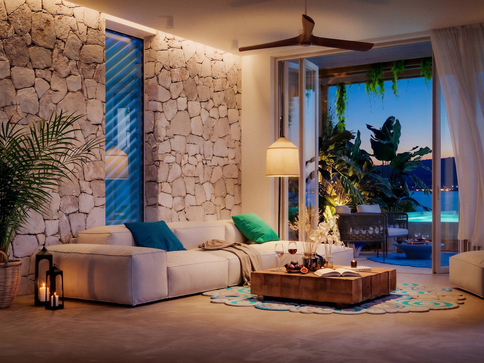 La Perla — stone-walled living room opening to a planted terrace