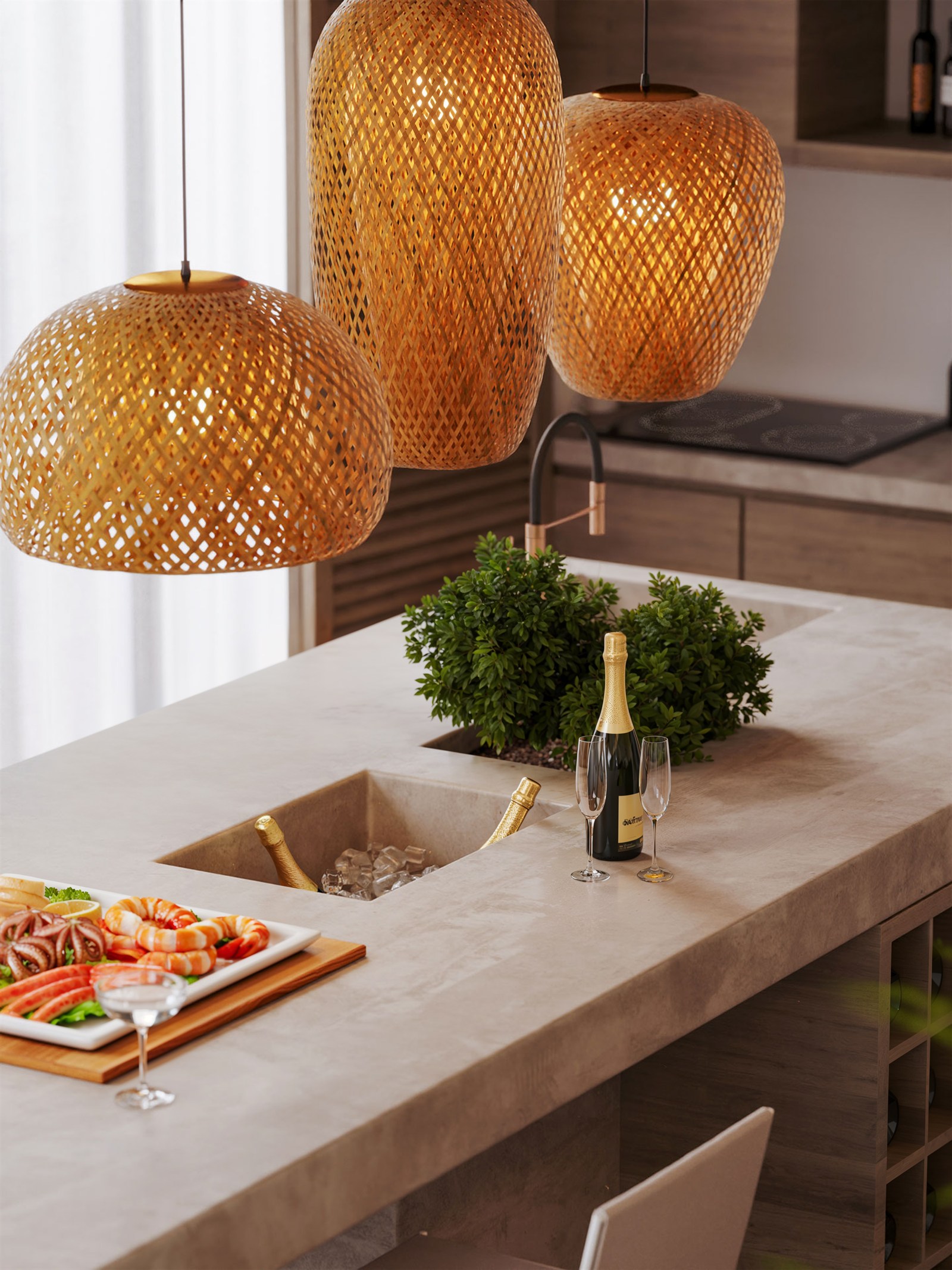 Rattan pendants over a stone kitchen island at night